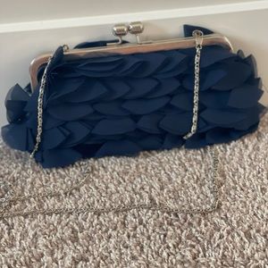 Blue ruffled purse with long strap